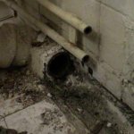 демонтаж чугунной трубы